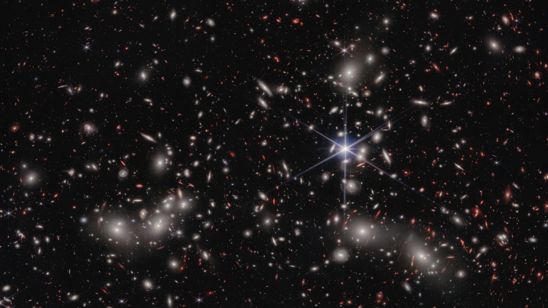 Astronomers Weigh a 'Little Red Dot' and Uncover a 'Naked' Black Hole